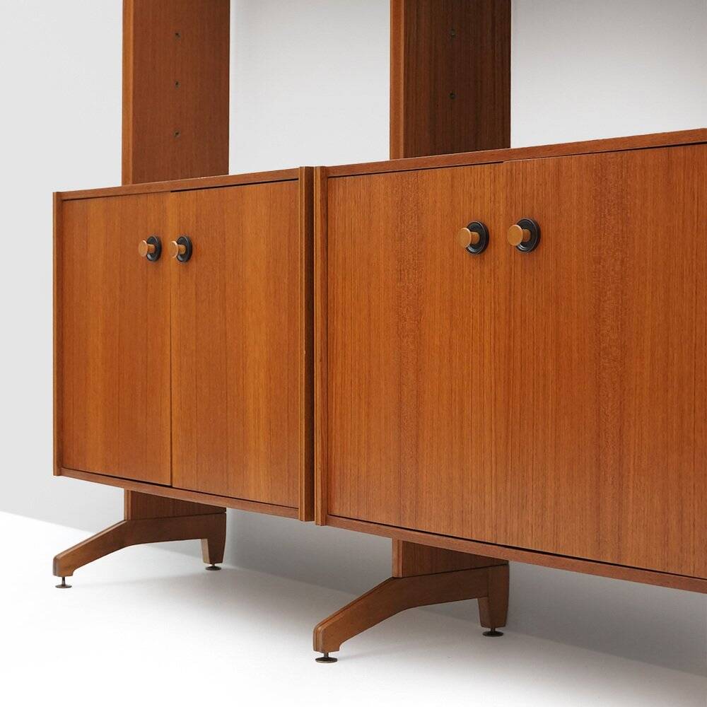 Library with wooden uprights by A.V. Contemporary Furnishings, 1960s.
