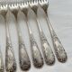 Set de 8 fourchettes en métal argenté sfam