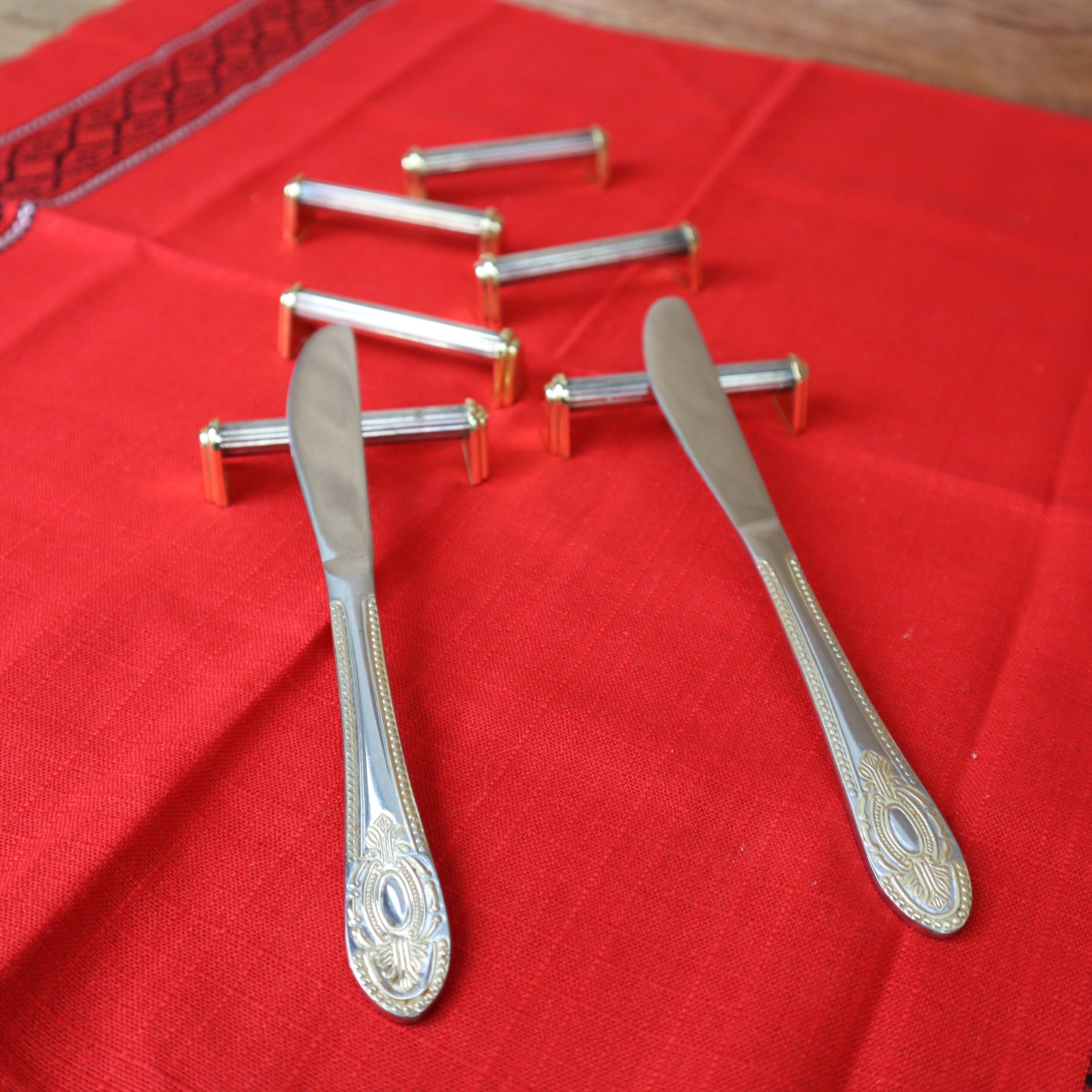 Set of 6 silver and gold metal knife holders