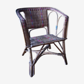 Small child vintage armchair in rattan