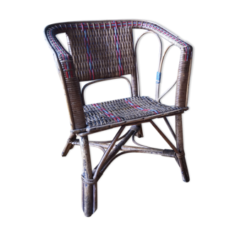 Small child vintage armchair in rattan