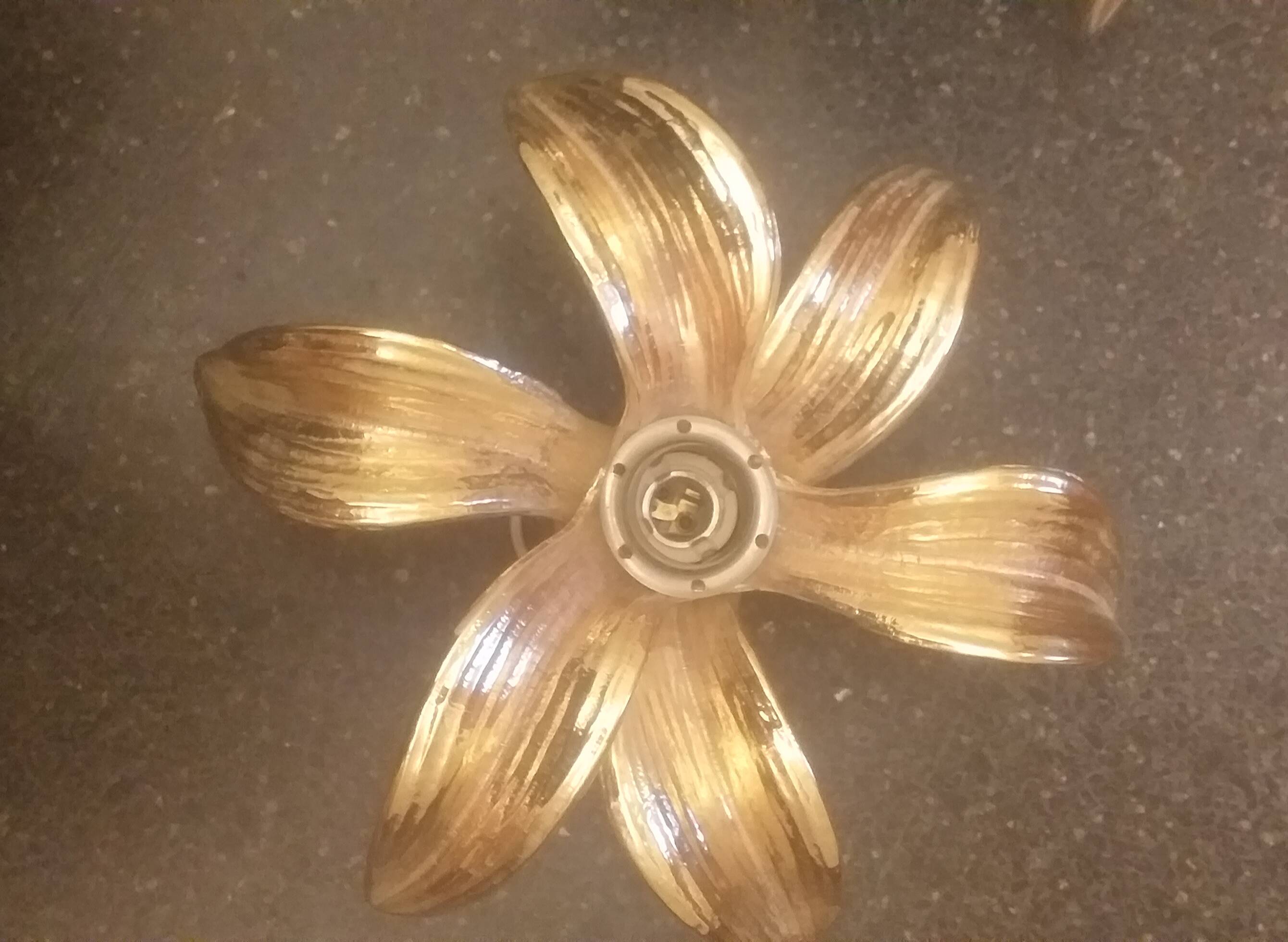 PAIR OF GOLD 1970S WALL LIGHTS - brass flowers by Willy Daro for Massive