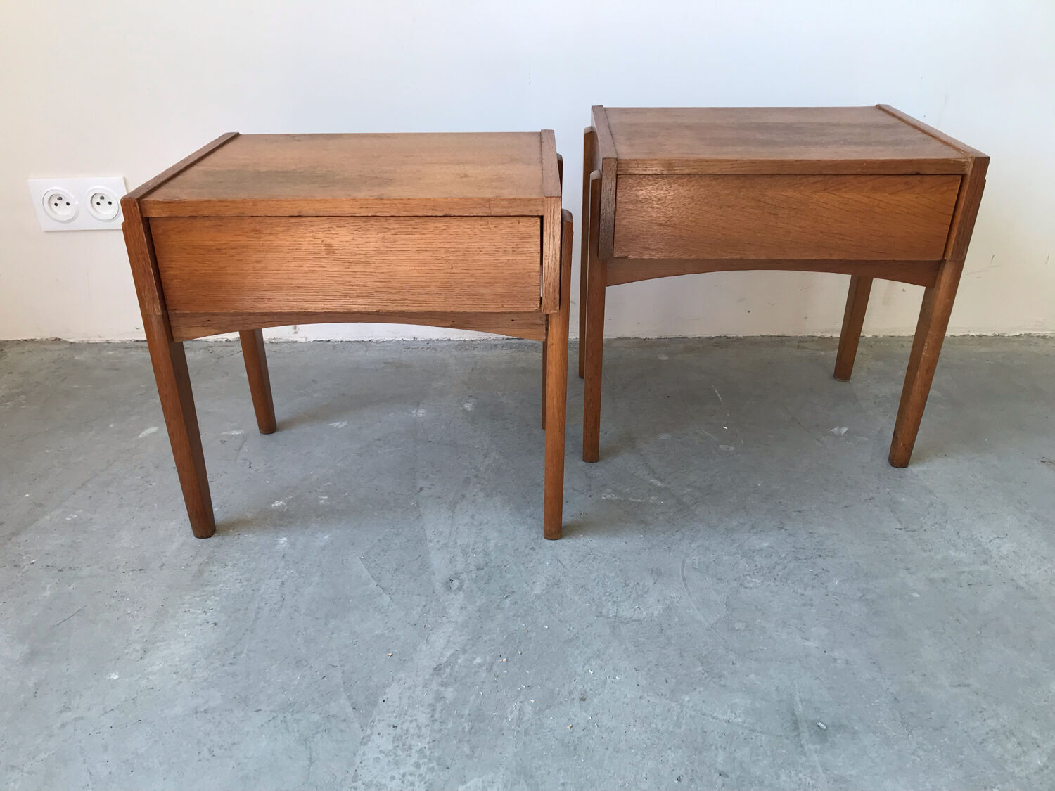 Pair of wooden bedside tables, circa 1950
