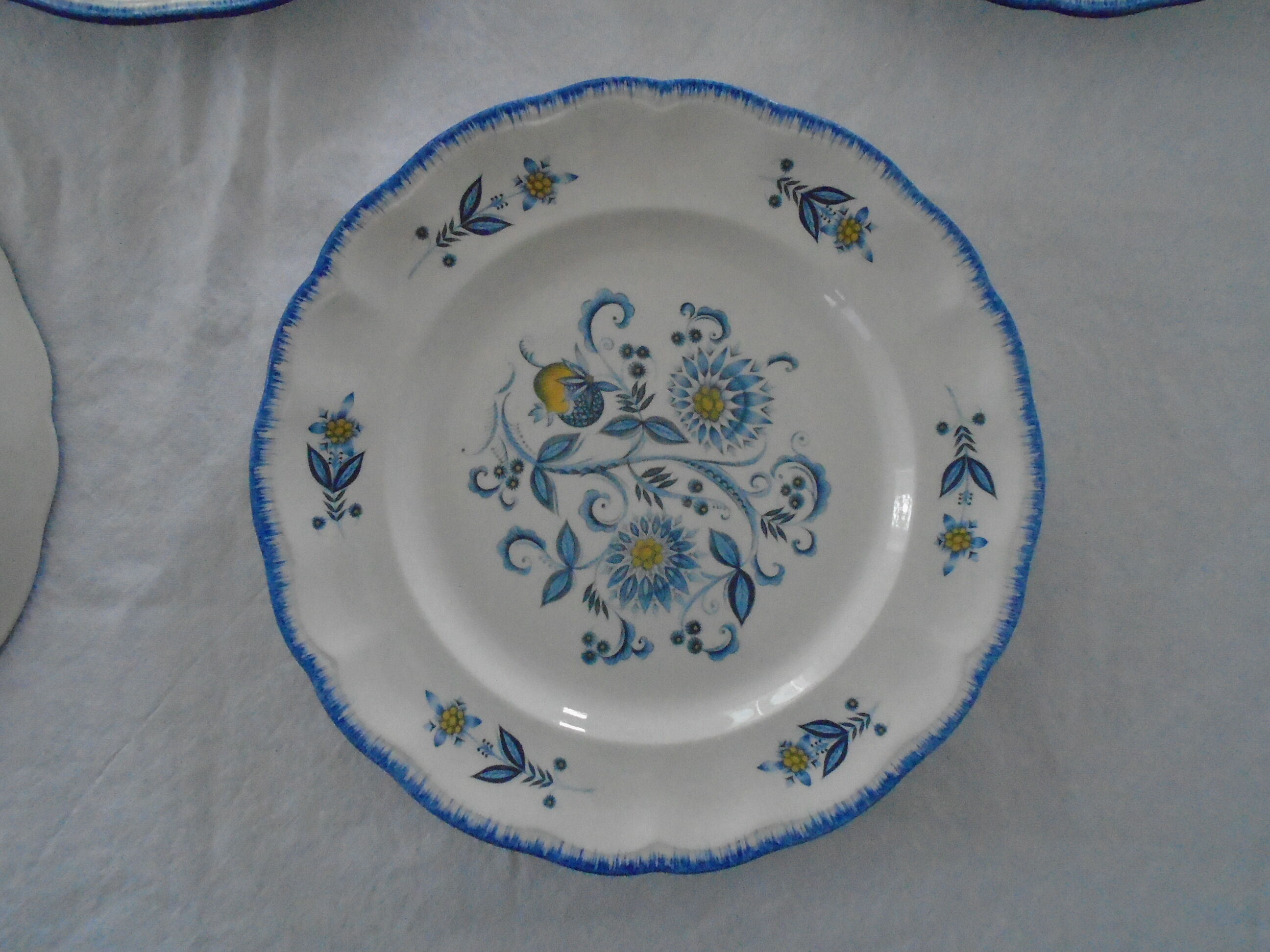 4 flat plates Keller & Guerin Luneville décor flowers Passionflower blue faience old