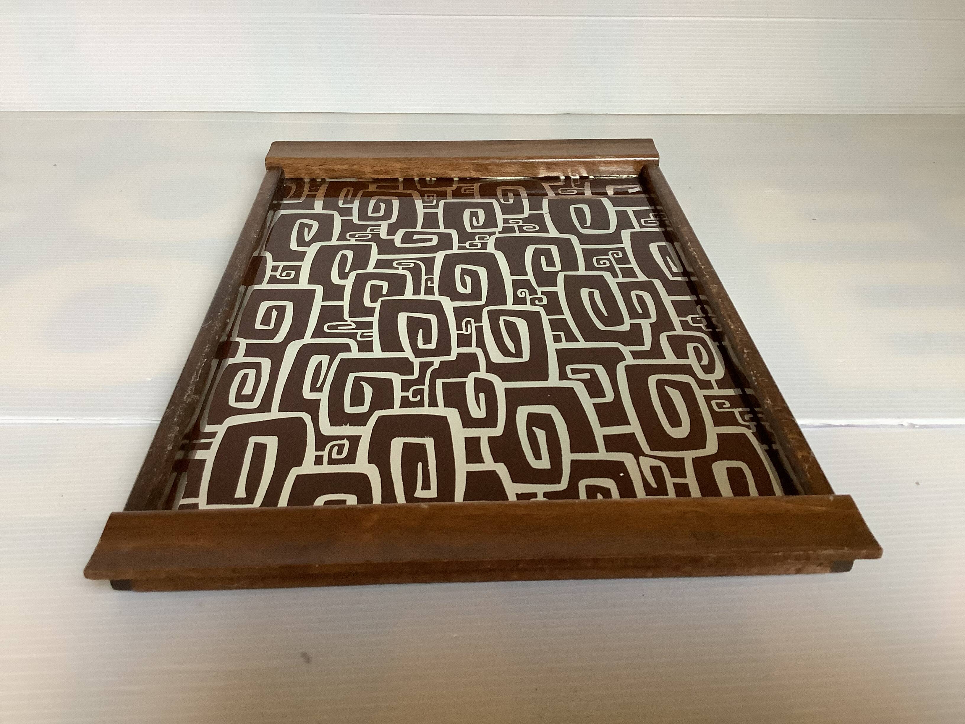 Vintage wooden tray with psychedelic Art Deco patterns.