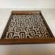 Vintage wooden tray with psychedelic Art Deco patterns.