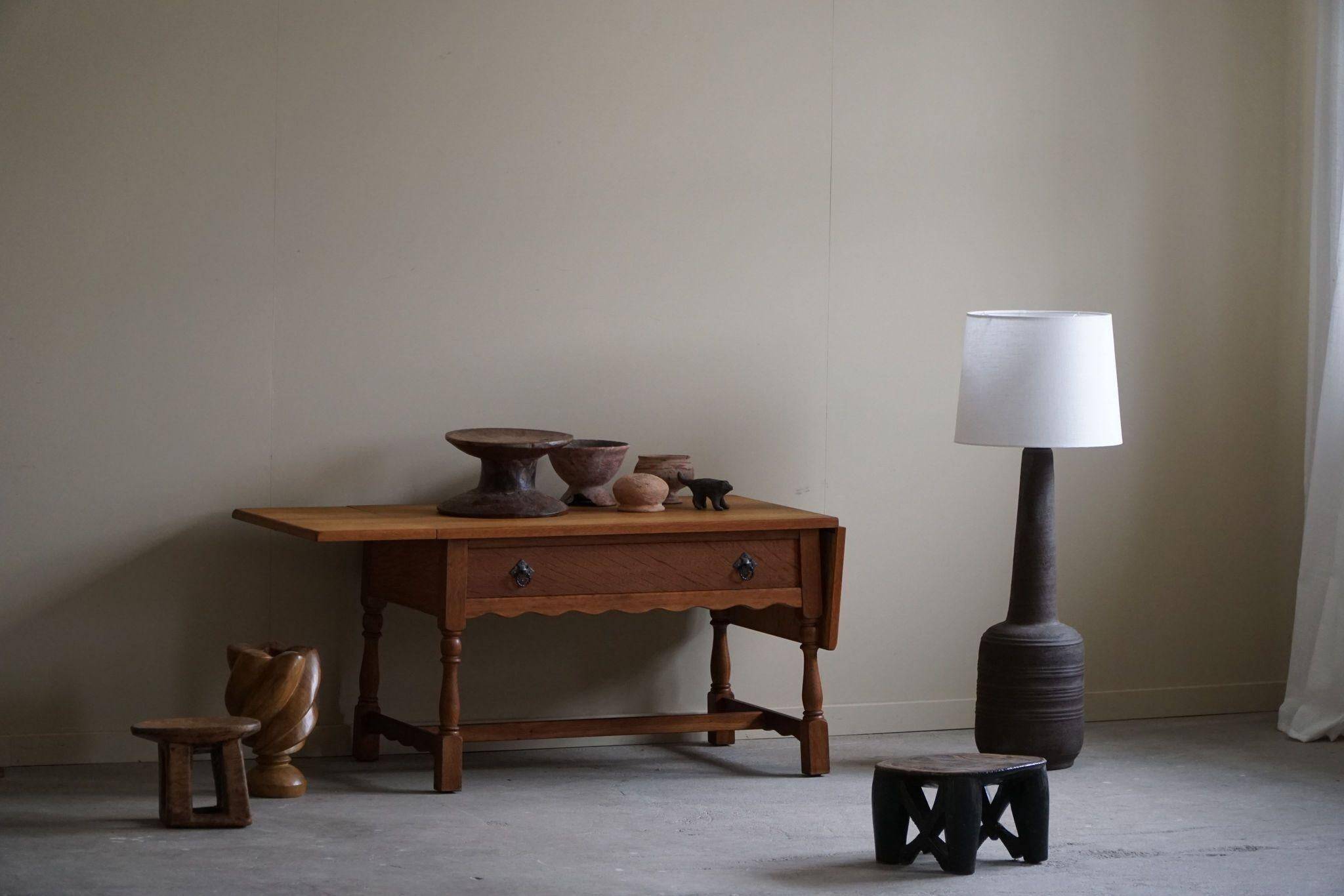 Danish folding table from the mid-century with a drawer in oak, Henning Kjærnulf, 1960s.