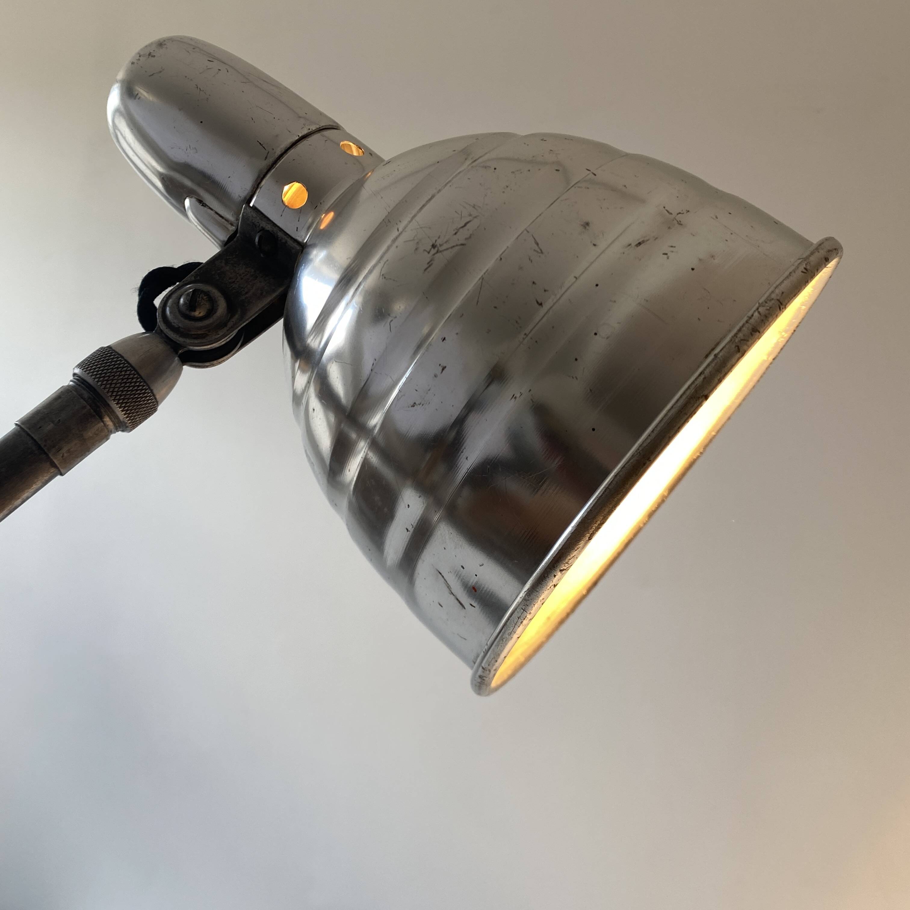 Old industrial wall light with counterweight.