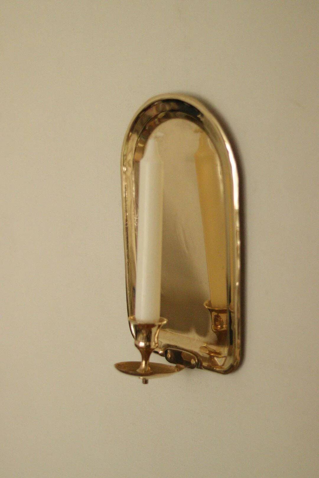 Single mid-century Swedish brass sconce