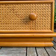 Dresser and its bedside table in rattan caning and vintage oak from the 1970s.