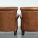 Set of two vintage sheepskin armchairs with beautiful and warm colours