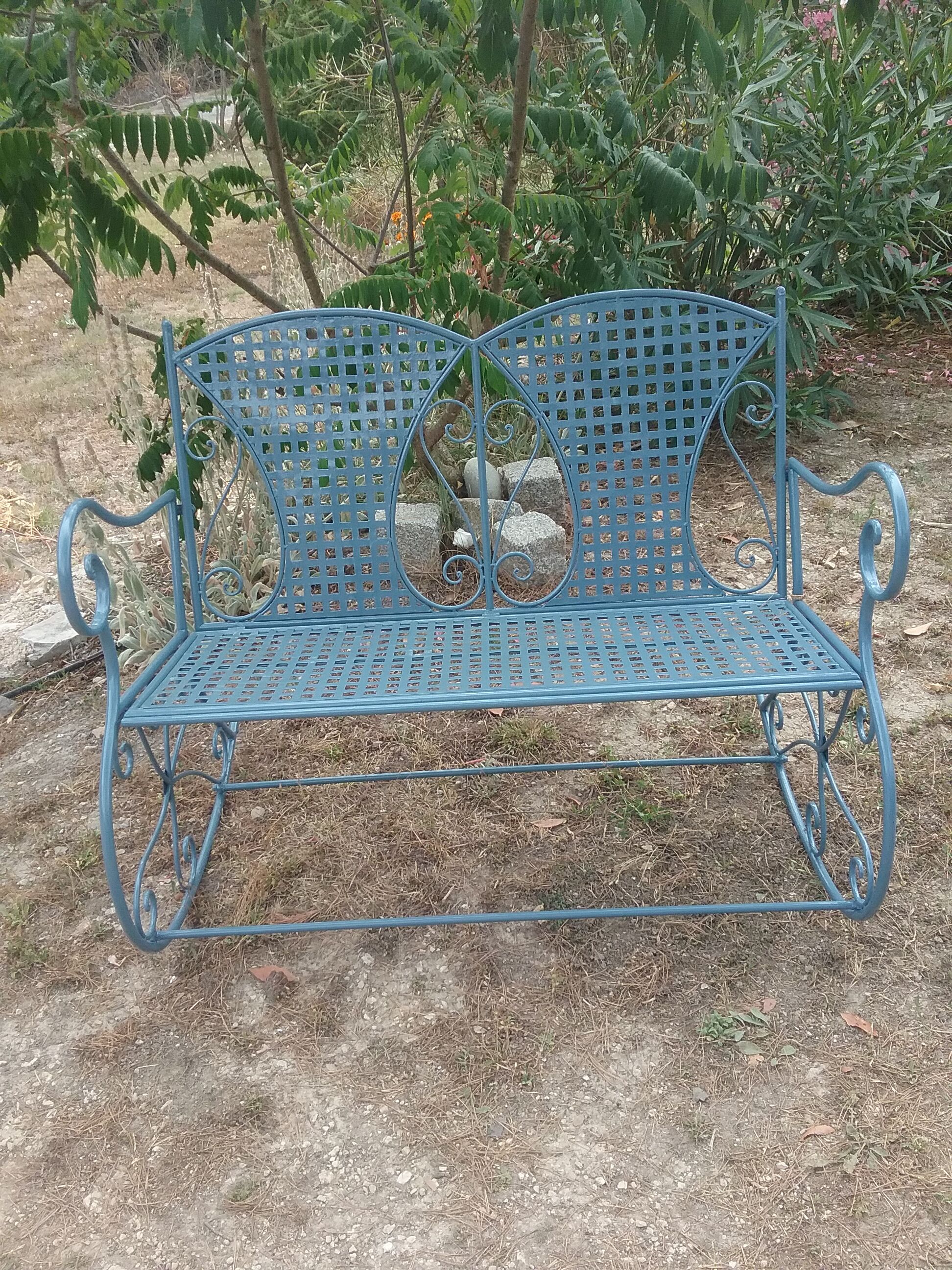 Large wrought iron rocking chair