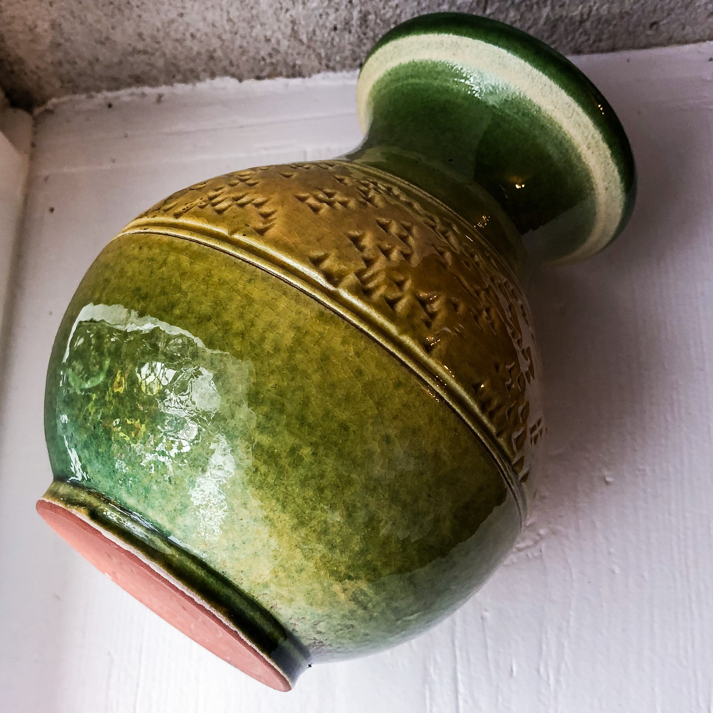 Yellow and green enamelled terracotta vase