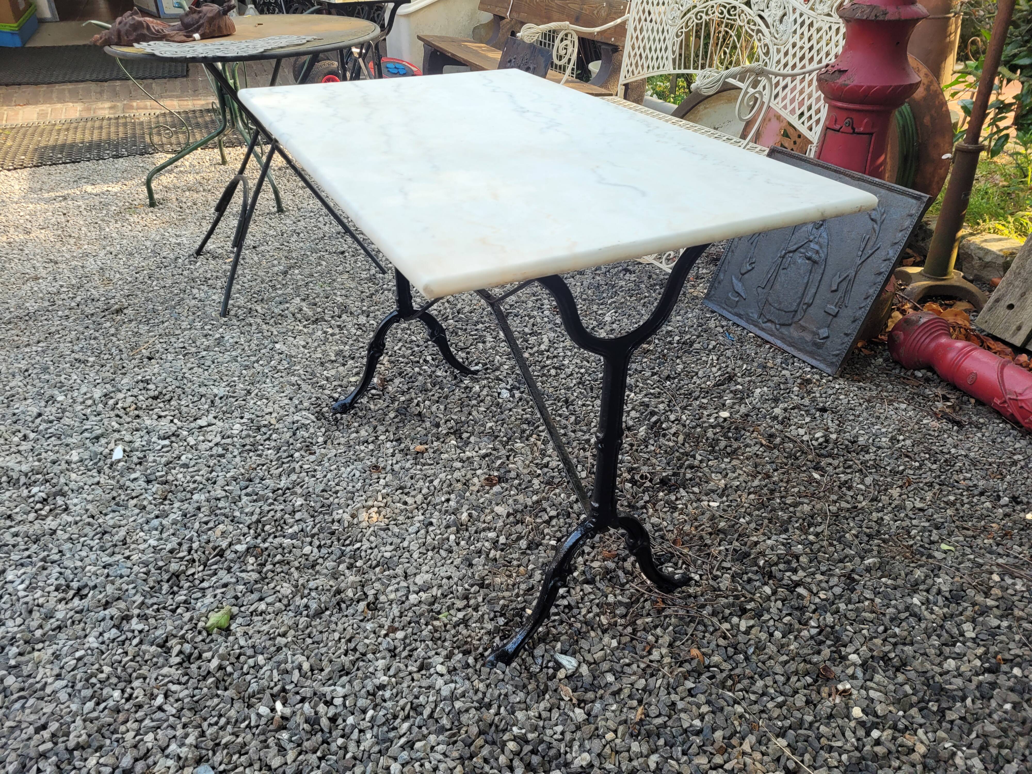Bistro table top marble foot cast iron