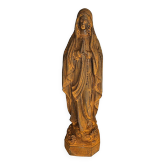 cast iron statue of the virgin