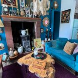 Tripod coffee table in natural solid elm magnifying glass