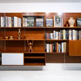 Immense teak library wall
