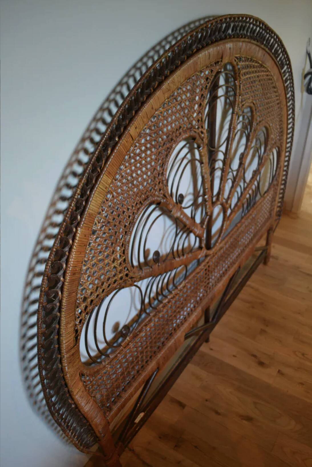 Brown peacock headboard for a 140cm bed.