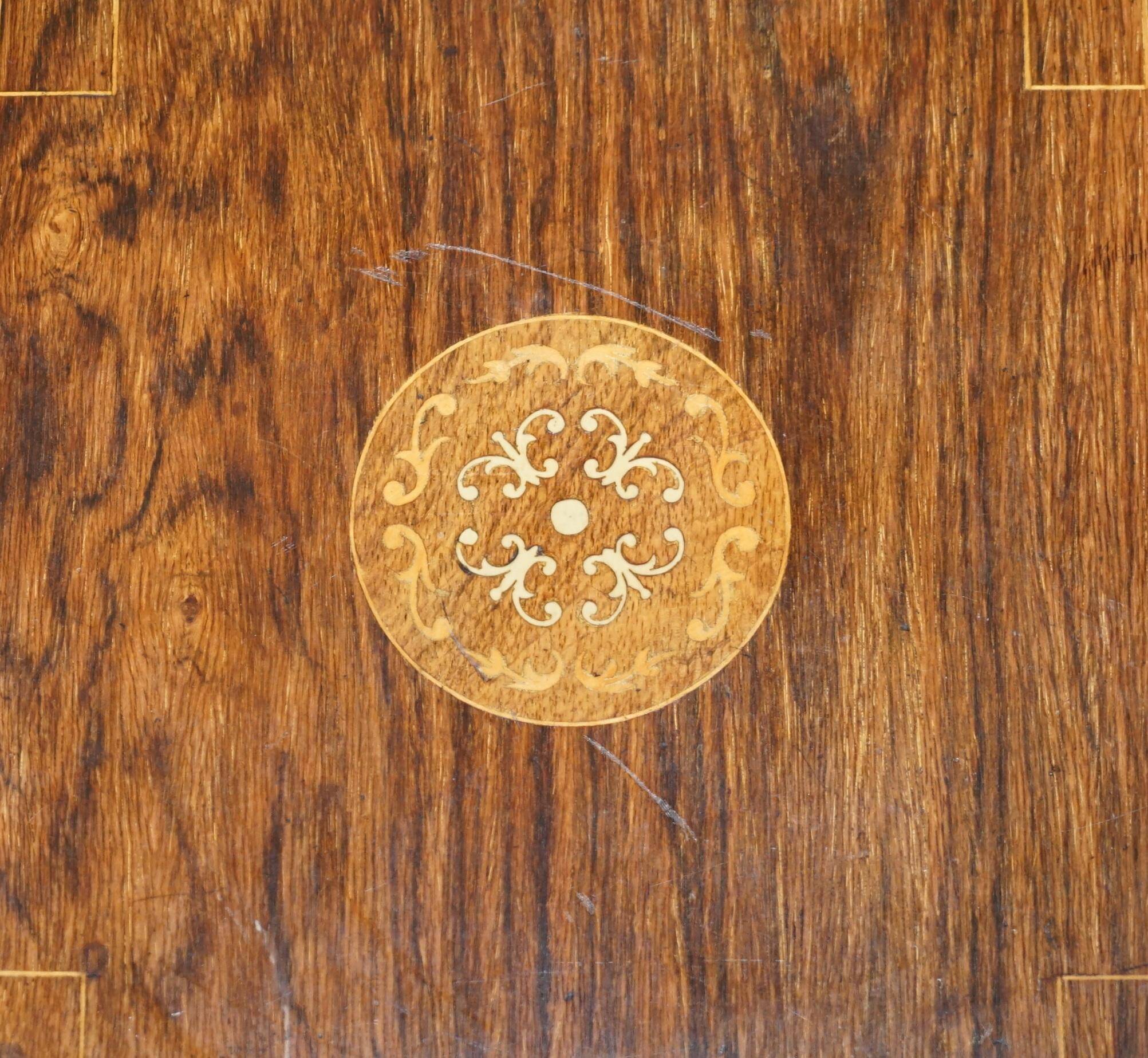 Edwardian revolving bookcase in hardwood with Sheraton inlay.