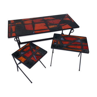 3 Pull-out tables, enamelled lava stone slabs and beaten iron