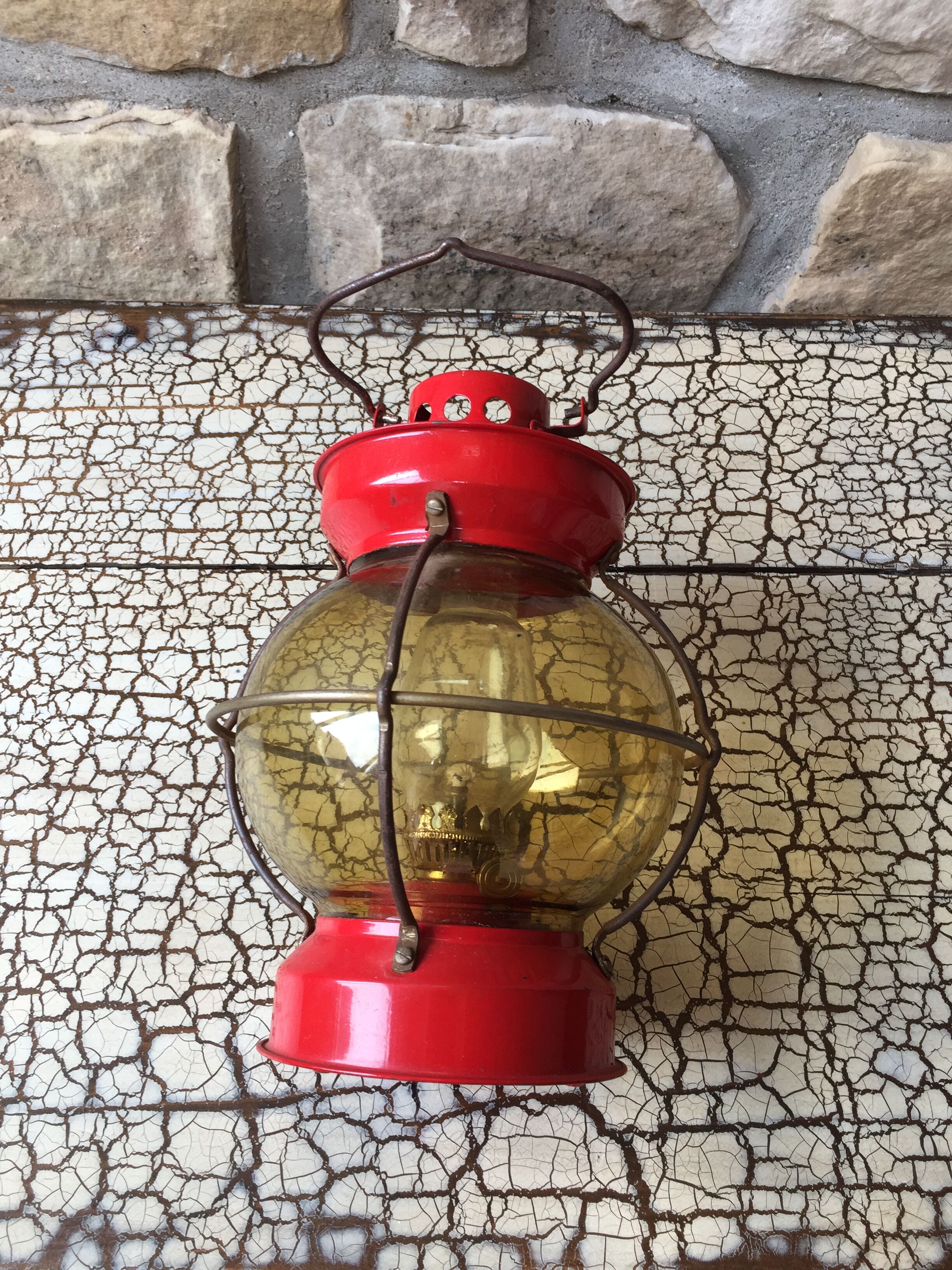 Vintage round glass and metal storm lamp