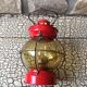 Vintage round glass and metal storm lamp