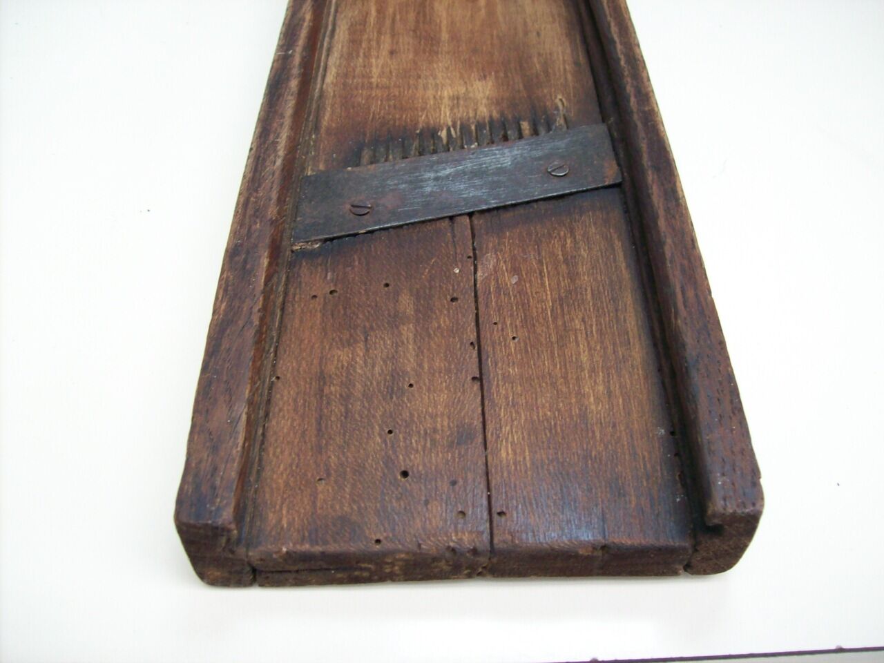 Old kitchen mandolin in wood and iron double blades