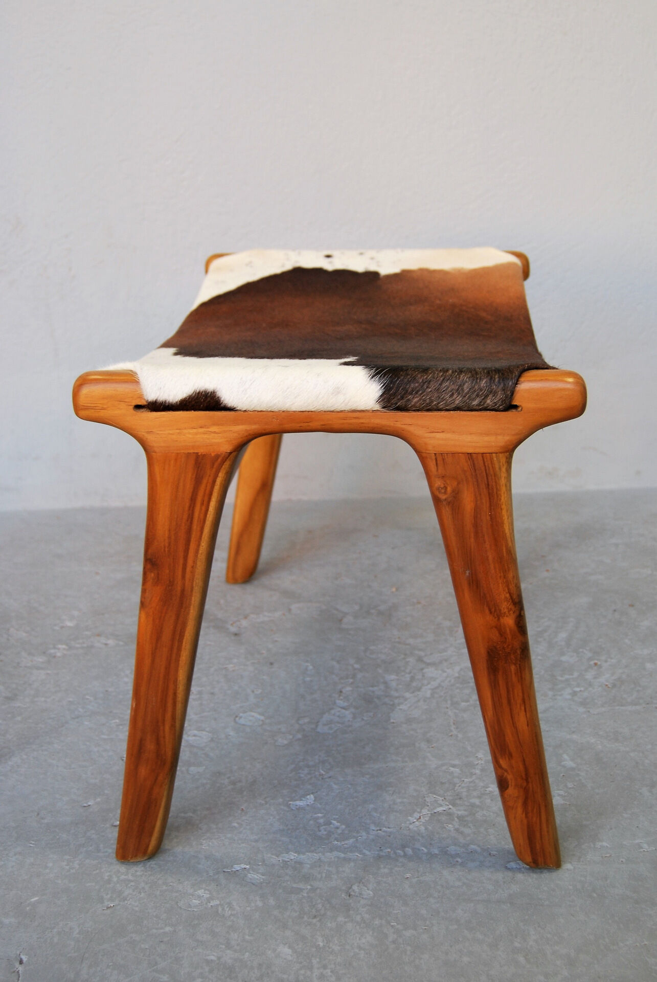 Chair in cowhide with ottoman inspiration Norwegian