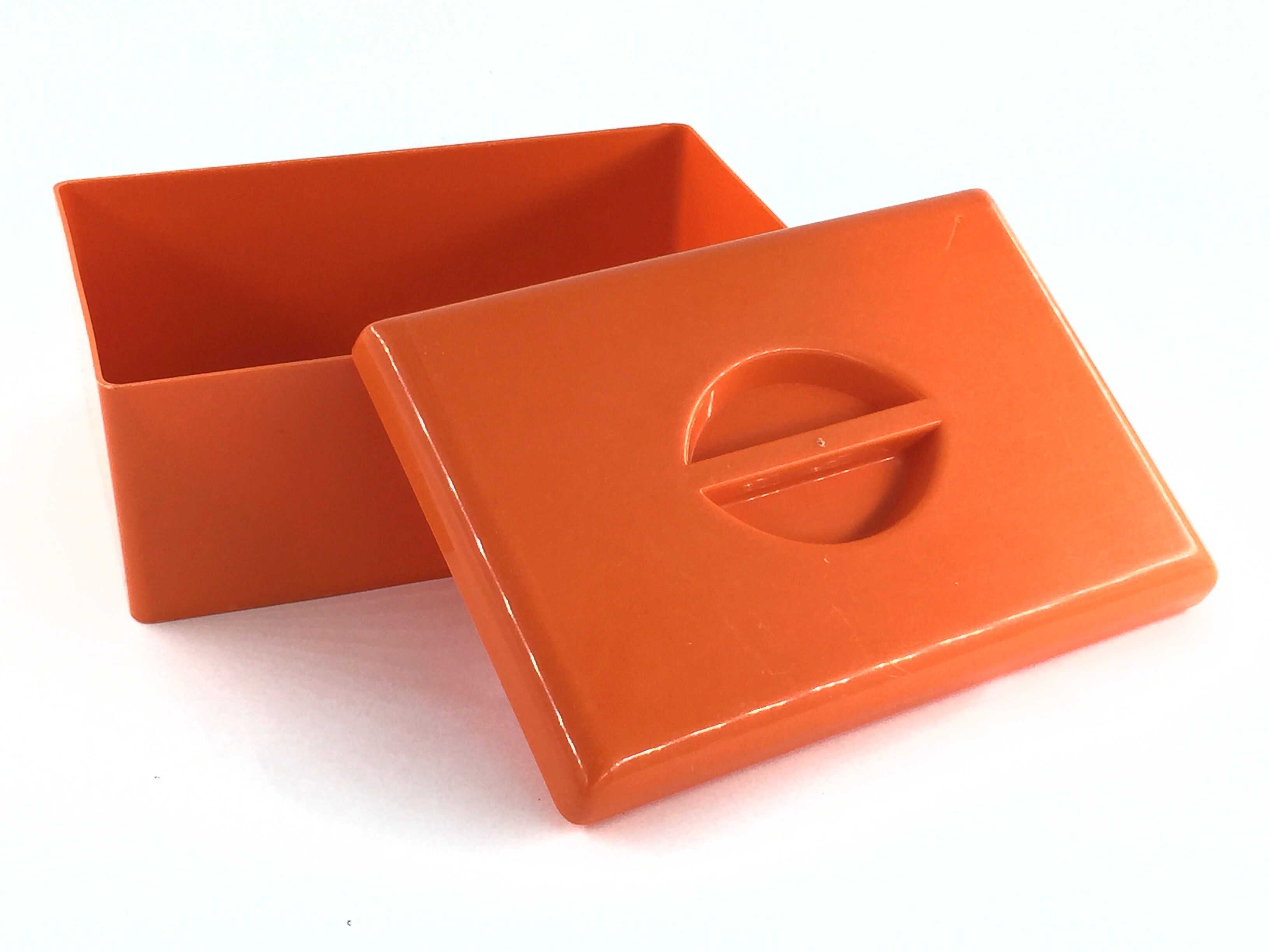 Vintage 70s box in orange plastic