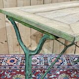Bistro table from the beginning of the 20th century, oak top and cast iron base