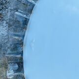 Toothed opaline suspension