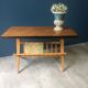 Coffee table, magazine rack with compass feet