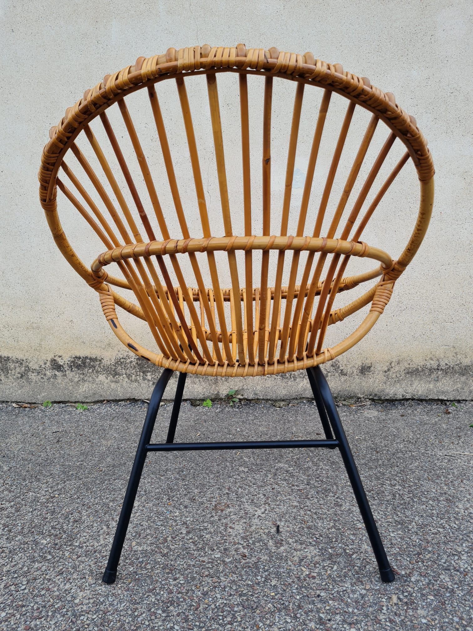 Vintage rattan shell armchair from the 60s