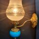 Pair of antique gold wall sconces