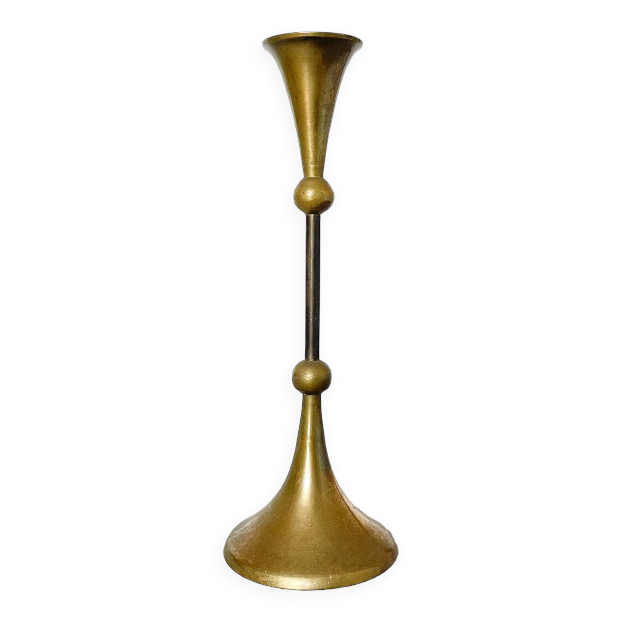 Tapered brass candle holder
