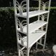 White wicker and rattan shelf