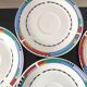 Set of small plates, vintage saucers in porcelain.