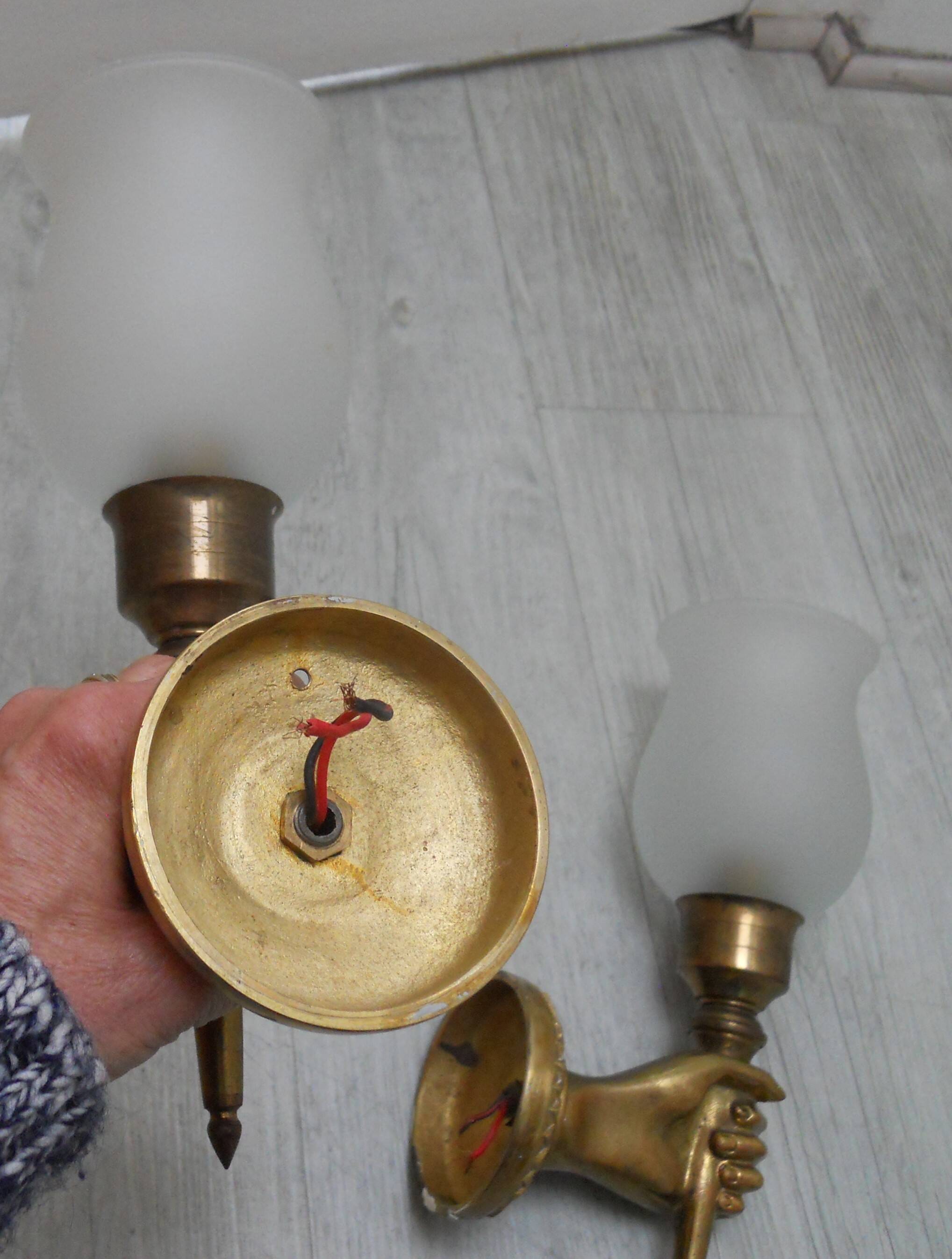 Pair of golden bronze flambeau sconces