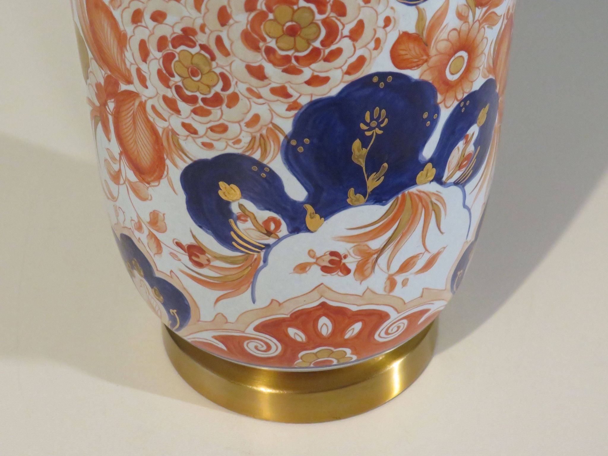 Vintage ceramic table lamp with an Imari-inspired pattern.