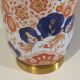 Vintage ceramic table lamp with Imari-inspired pattern.