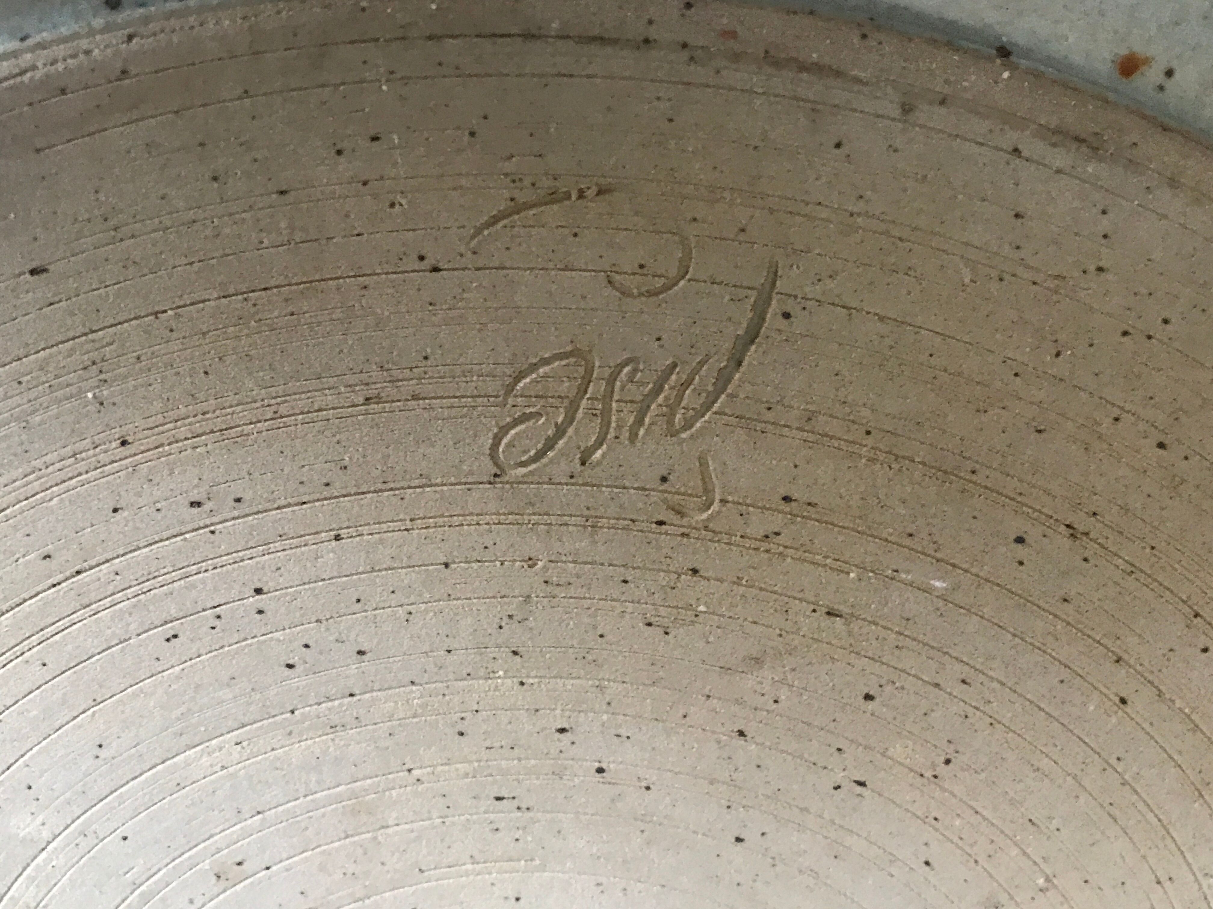 Large sandstone dish sign