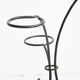 Arched steel flowered foot for balconies and terraces