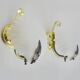 Pair of shell wall lights in glass and gold-plated metal. 1980s
