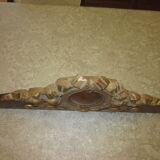 Old wooden pediment stucco