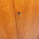 Vintage modernist wardrobe in teak and metal from the 1960s.