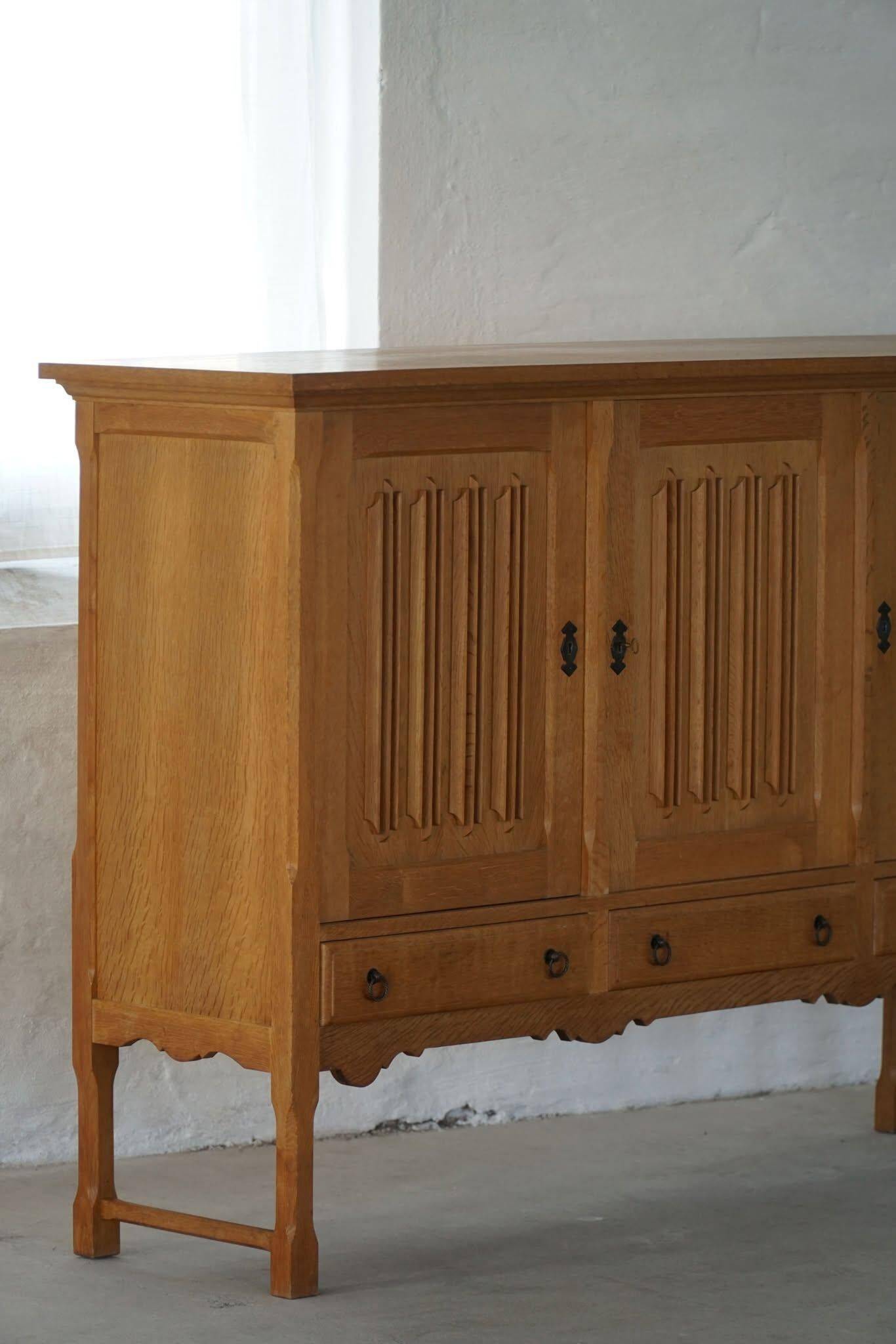 Brutalist oak sideboard, mid-century Danish design, Kjærnulf style, 1960s.