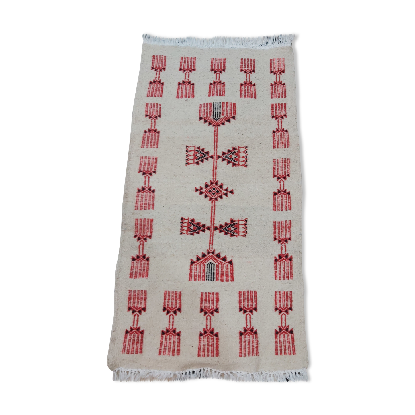 Traditional handmade white and red carpet