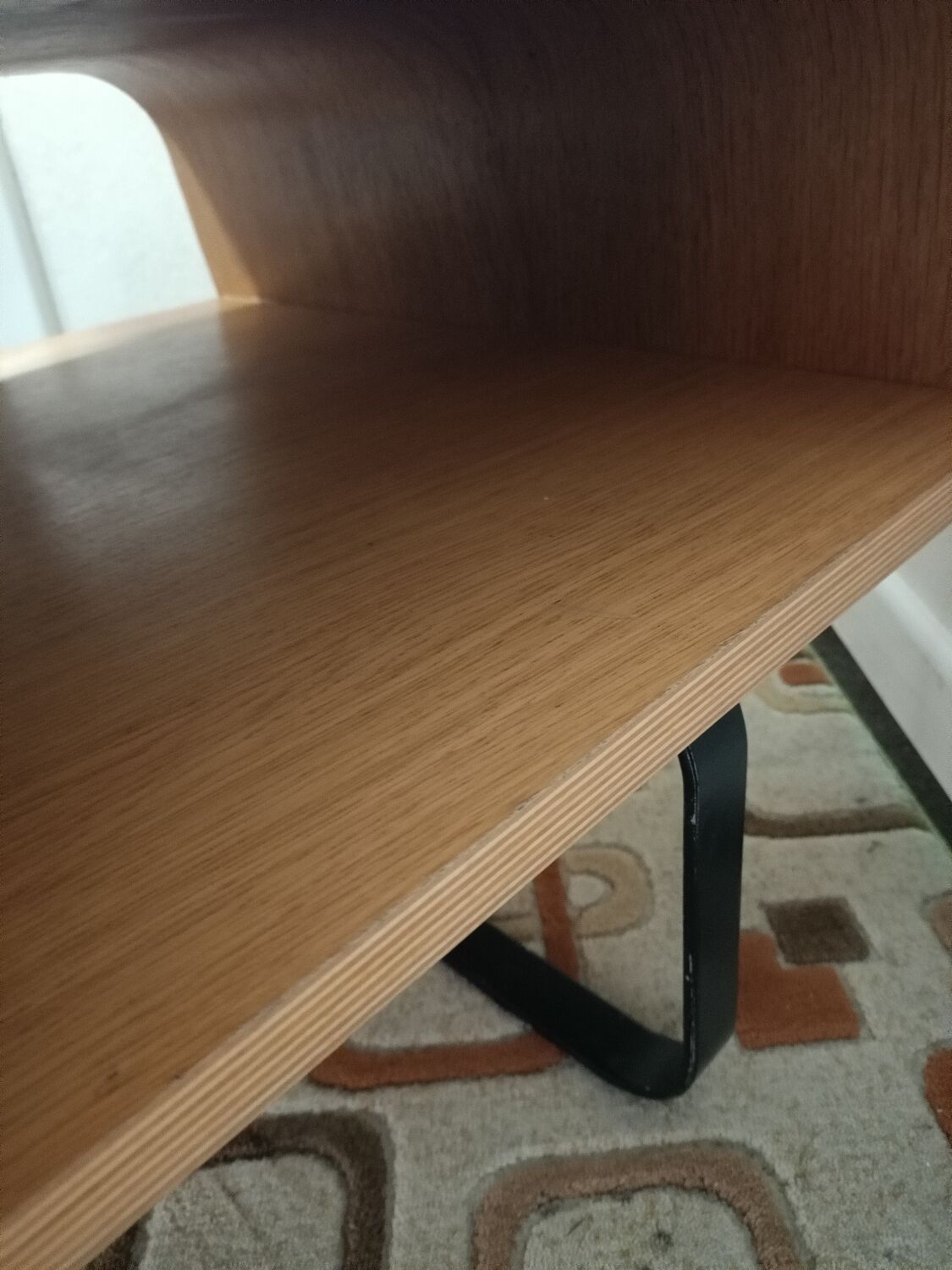 Curved wooden coffee table