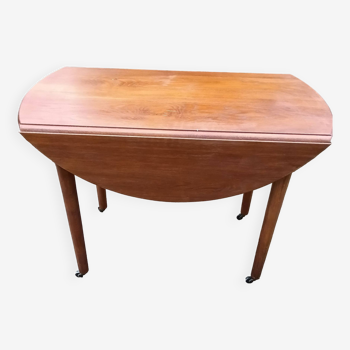 Shuttered table on casters