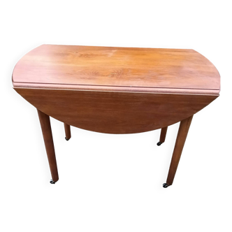Shuttered table on casters